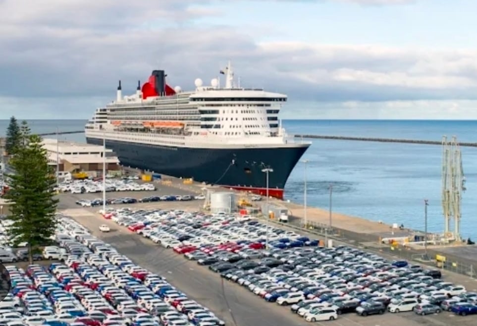 Cunard Queen Mary 2 berthed at Outer Harbor, Adelaide, with the breakwater and Gulf St Vincent behind